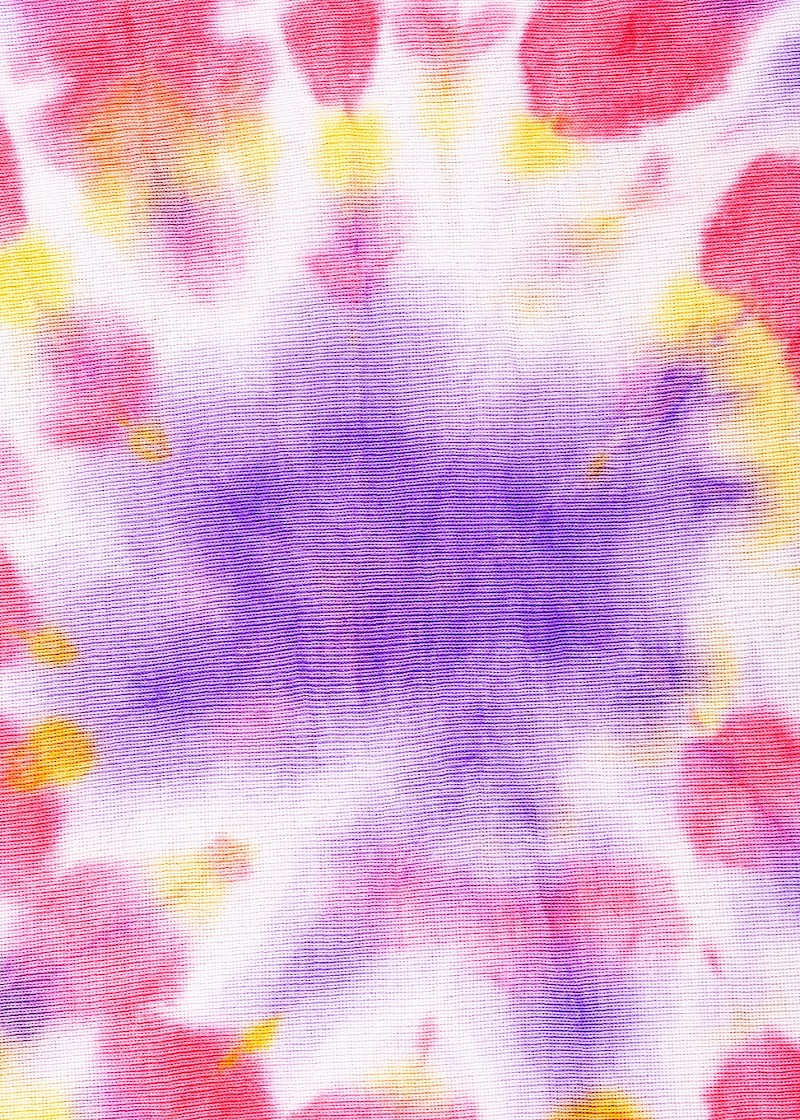 A vibrant tie-dye pattern with a purple center radiating outward into pink, yellow, and soft white swirls, forming a starburst design.