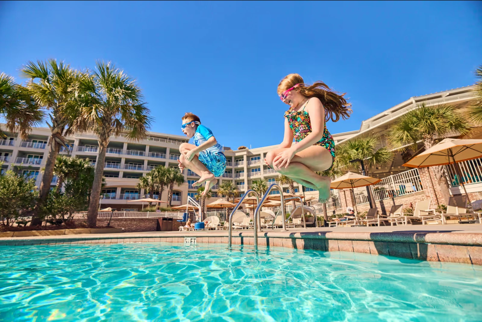 Two Kids at Sweetgrass Inn Pool