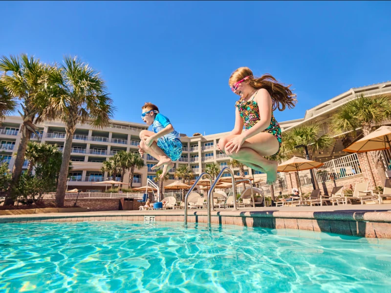 Two Kids at Sweetgrass Inn Pool